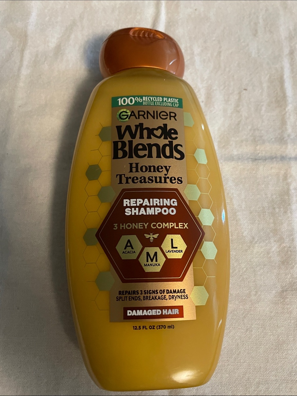 Garnier Whole Blends Honey Treasures Shampoo - Yellow with Gold Accents